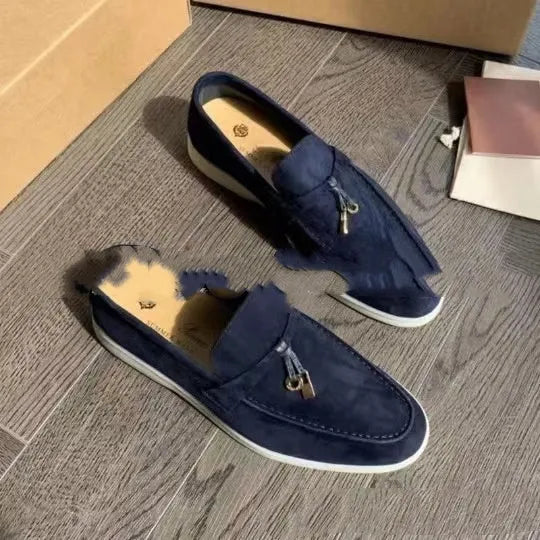 High top slip-on loafers with round toe cap and visible stitching on artificial PU upper