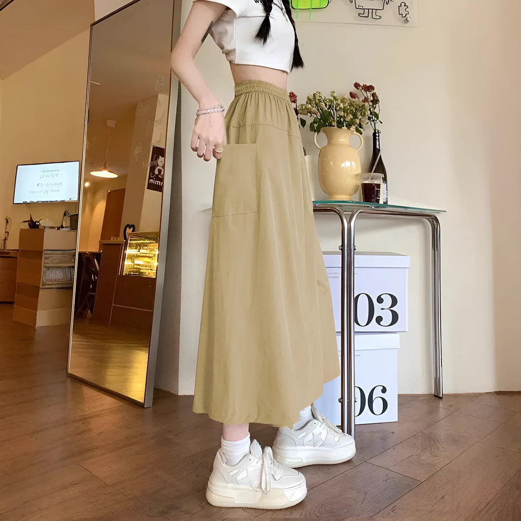 Camel coloured women's cropped wide leg skirt with elastic waist and quilted detailing