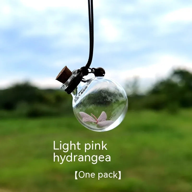 Glass car perfume pendant with preserved flowers for interior decoration and air freshening