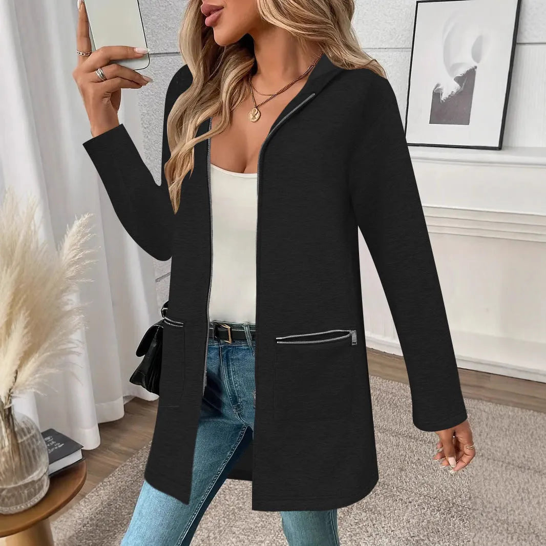 Grey loose-fit women's mid-length cardigan coat with pockets on a hanger.