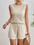 Solid colour women's sleeveless vest and shorts lounge set in apricot or orange polyester fabric