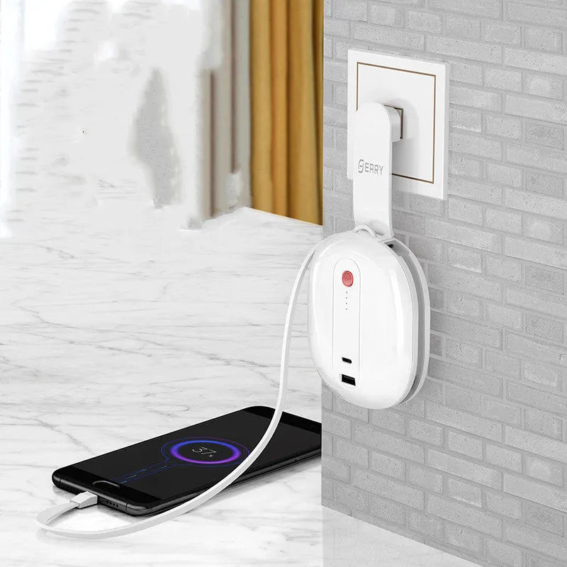 White and black two-in-one power bank with built-in wall plug showing 10000mAh capacity