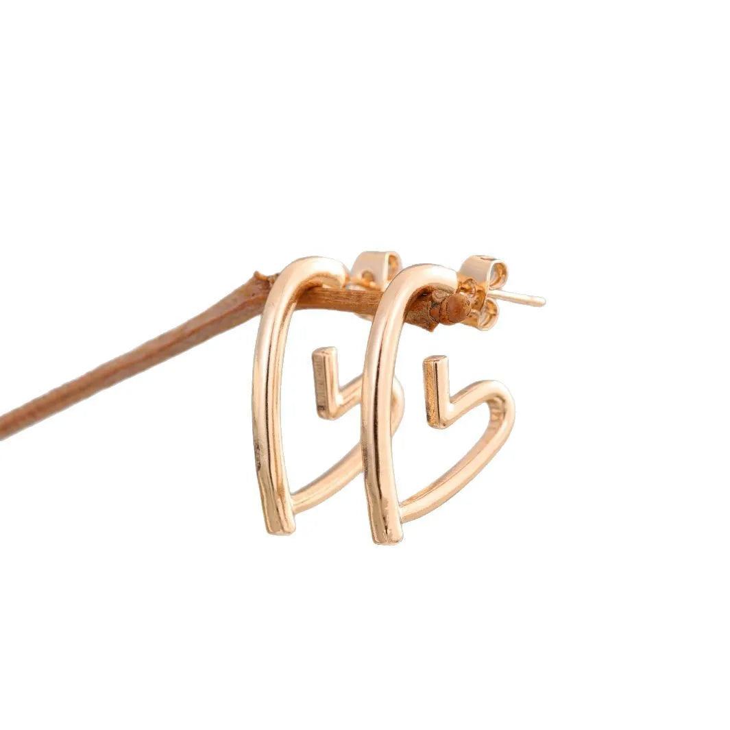 Golden love earrings for women with a simple cold style heart design