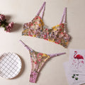 Women's floral pure desire style bikini set in polyester fabric on a colour swatch background.