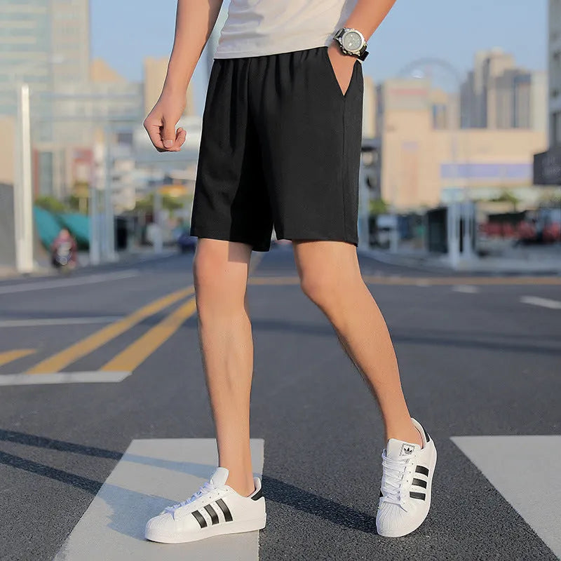 Men's cotton sports shorts in grey, black, or blue, five-point style, sizes L to 10XL, quick-drying.