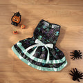 Colourful Halloween dog skirt with pumpkin and skull prints on a pet mannequin, showing double-layer design.