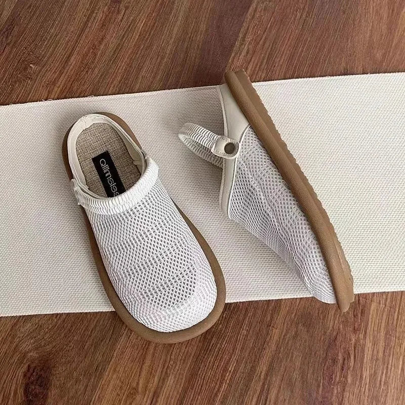 Beige Mori girl style slip-on shoes with a round toe and linen upper on a soft rubber sole.