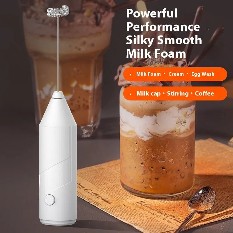 Mini handheld electric milk frother in black, white, or khaki colour with USB charging cable.