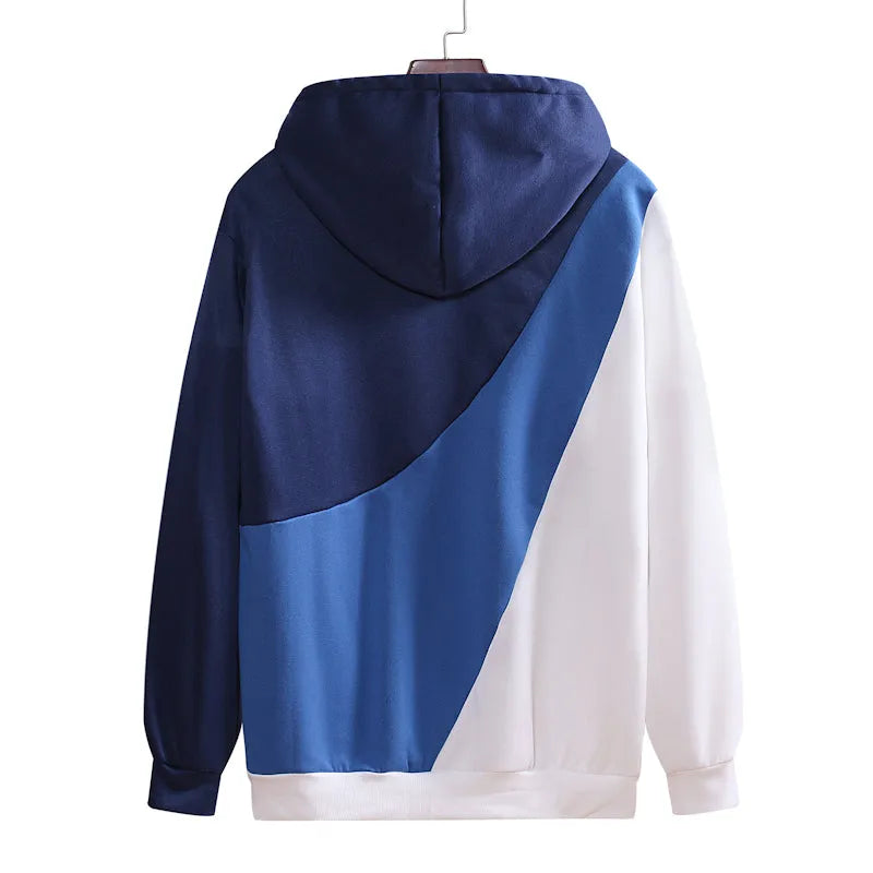 Casual men's loose hooded pullover sweater in blue-white with geometric colour-blocked stitching and save pockets