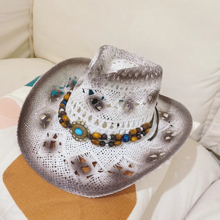 Women's brown straw cowboy sun hat with stitching detail on white background