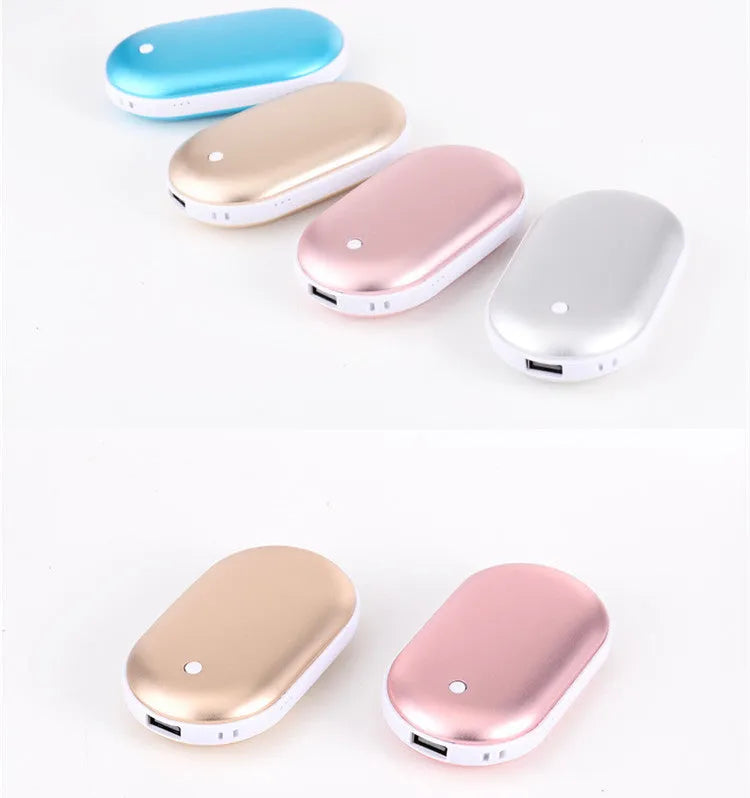 Compact rechargeable hand warmer and power bank in rose gold finish showing size relative to a hand.