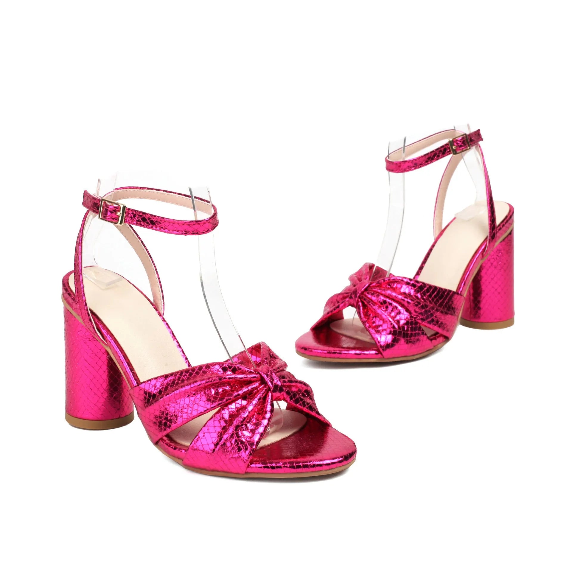 Gold women's plus-size high heel peep toe sandals with an ankle buckle strap on a white background.
