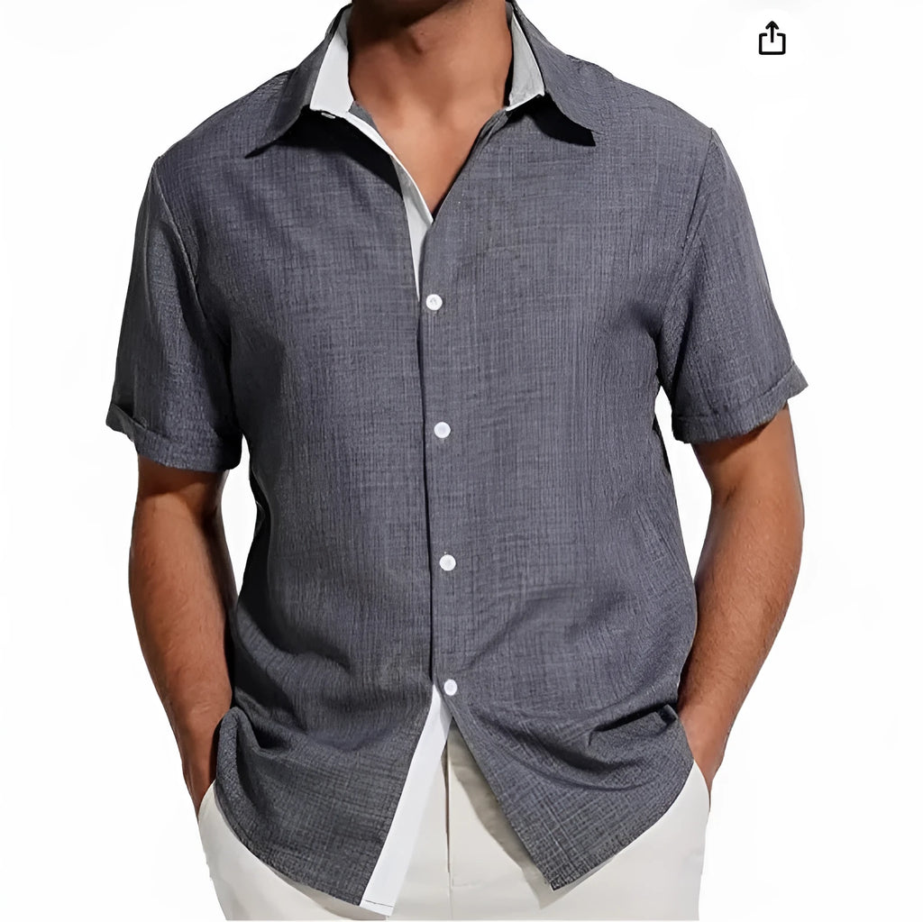 Men's floral print short-sleeved shirt in light grey polyester fabric on a hanger.