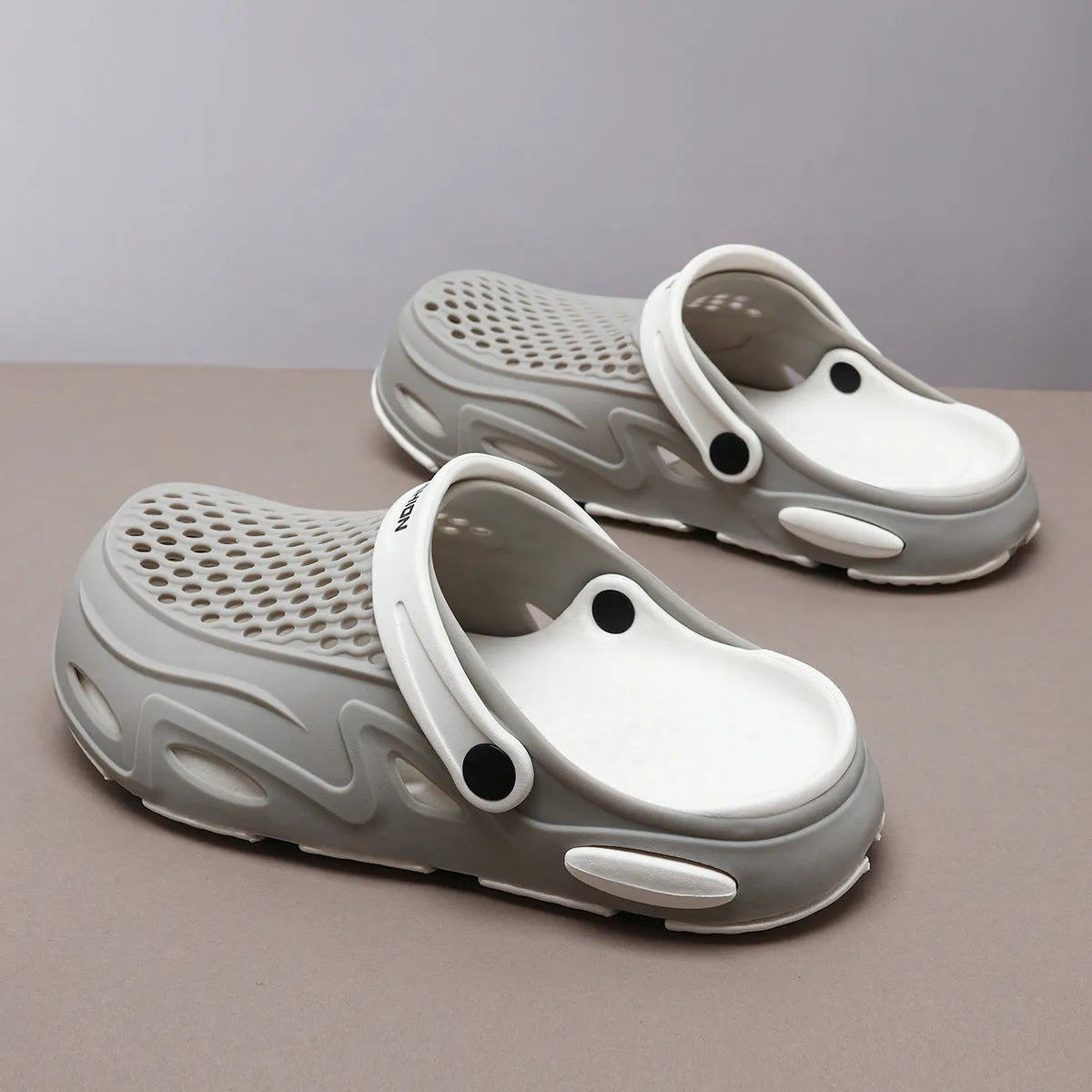 Men's grey closed toe beach slippers with non-slip sole and breathable grid pattern design