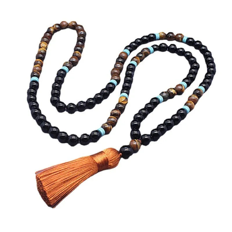 Black agate bracelet and matching necklace with a Tiger pattern stone pendant.