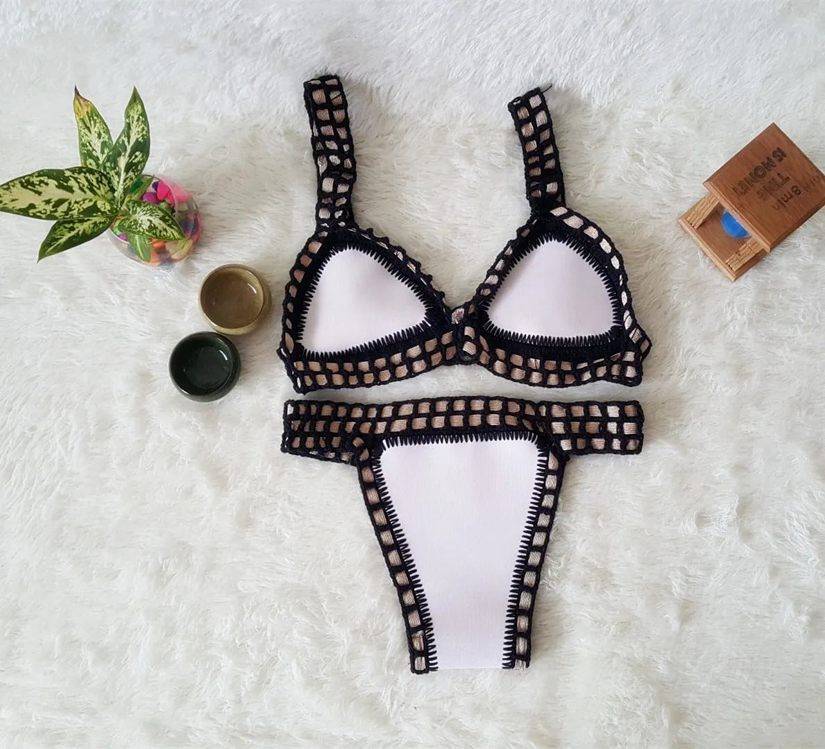 Hand crochet colourful bikini set with lace trim and rubber straps in multiple colours on white background