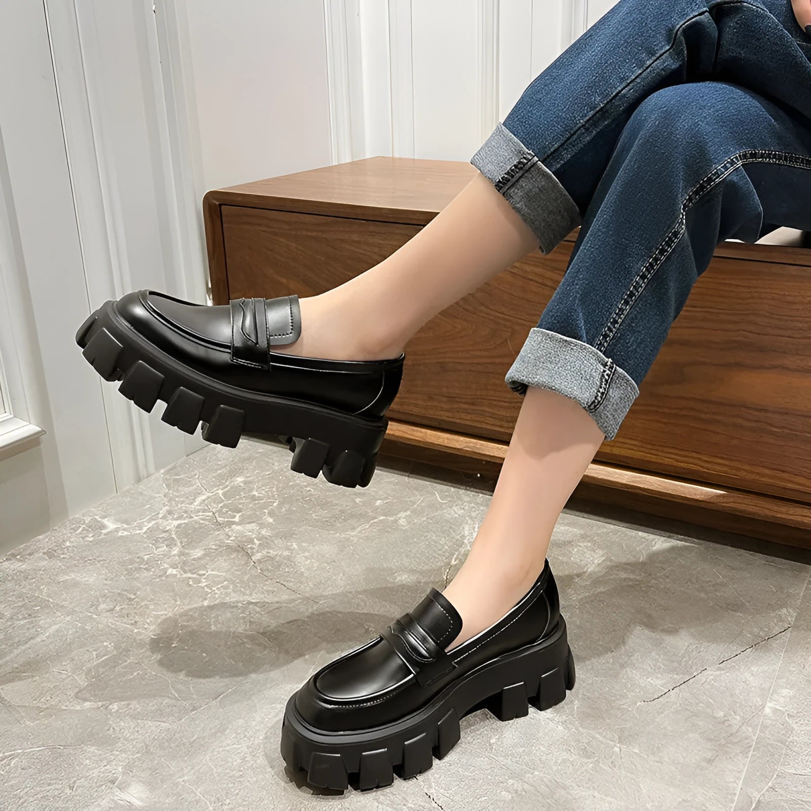 British style wide fit loafers in patent leather and matte finishes on a muffin base rubber sole.