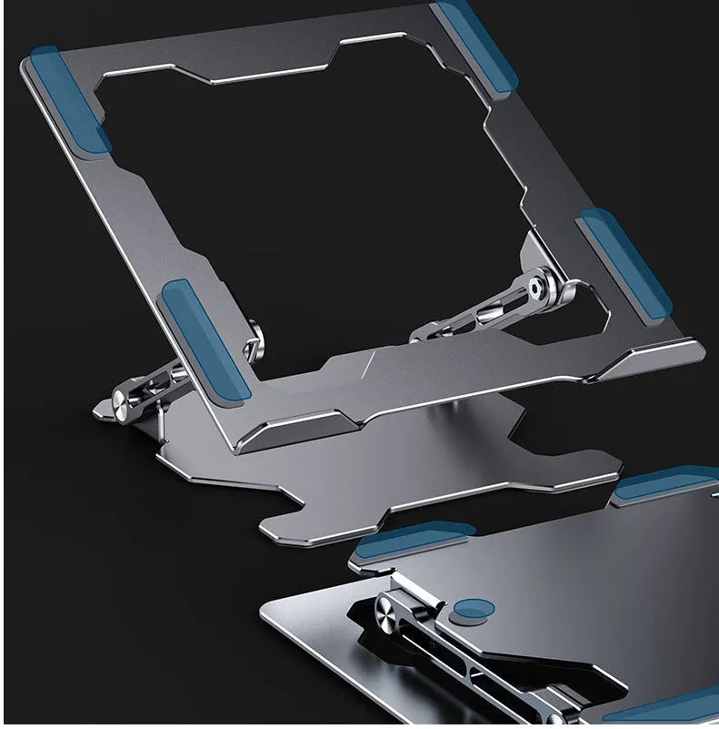 Grey aluminium laptop stand in a folded position next to an open laptop, showing its adjustable angle and hollow design.