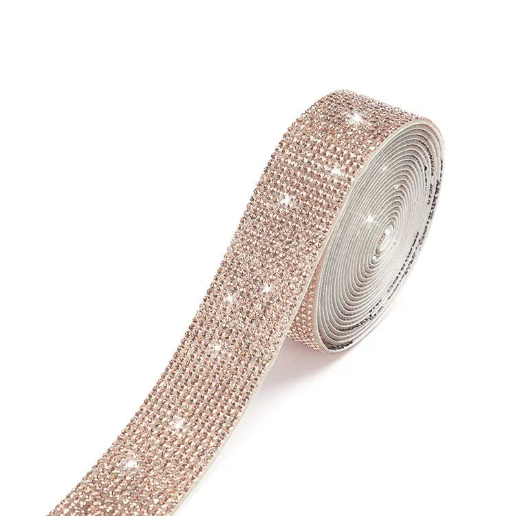 Self-adhesive glass water drill strip on a 1-yard roll for clothing and shoe decoration.