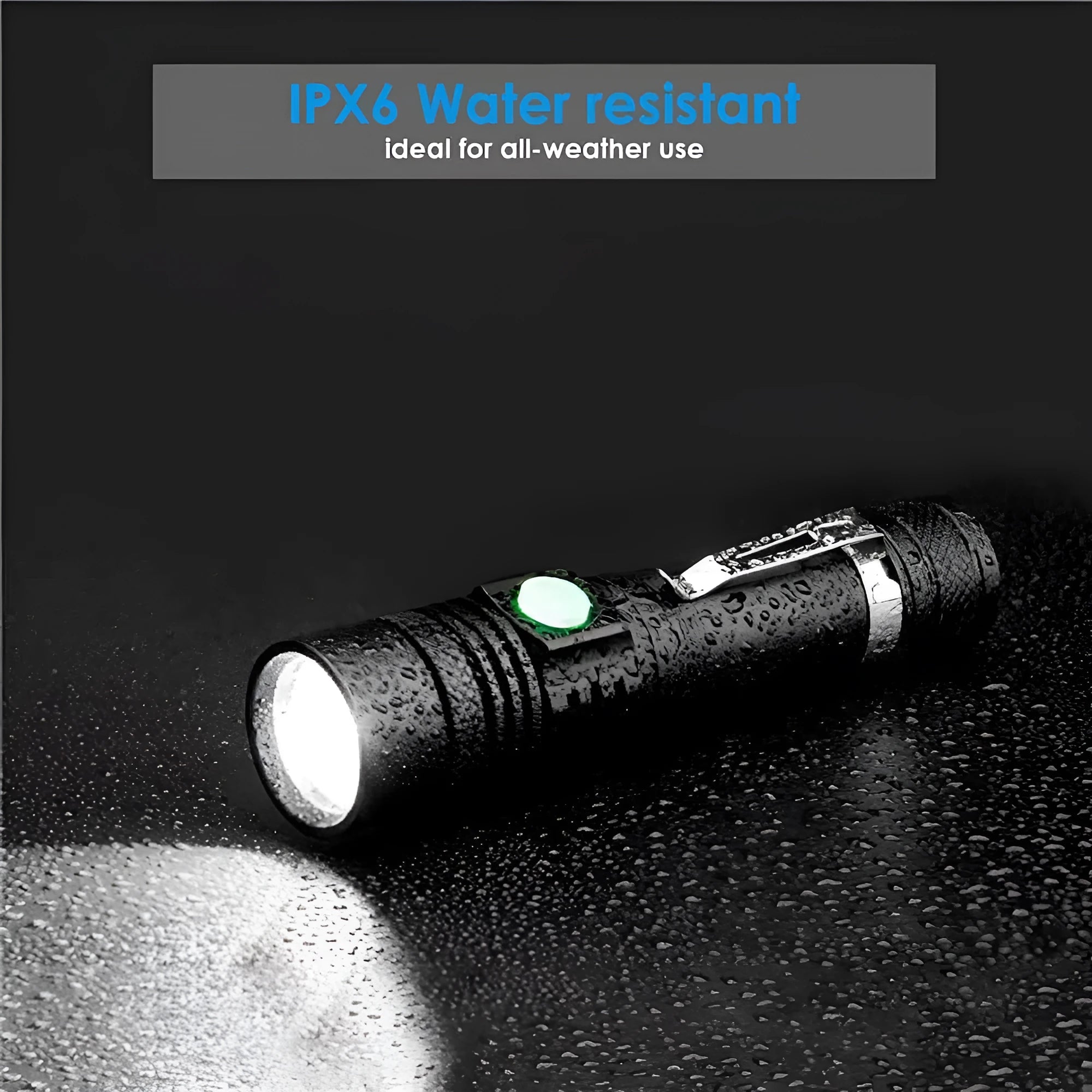 Black telescopic zoom USB rechargeable T6 LED flashlight on outdoor background