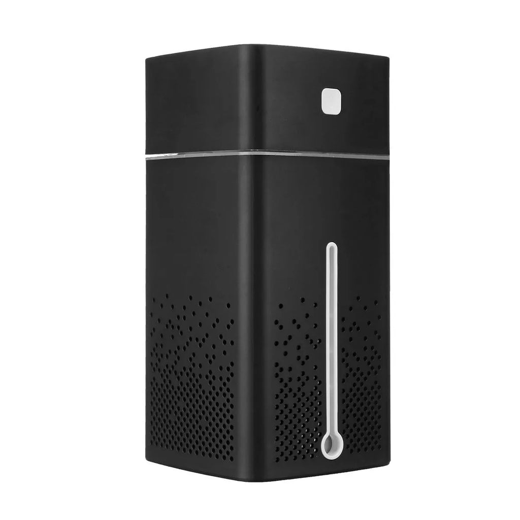 Black and white USB-powered desktop humidifier with 1000ml water tank on a desk.