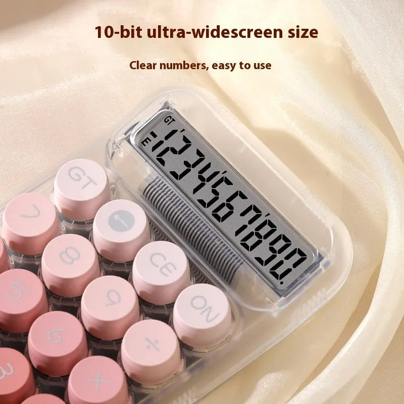 Round gradient colour mechanical keyboard calculator in mute blue, green, pink, or purple on a desk.