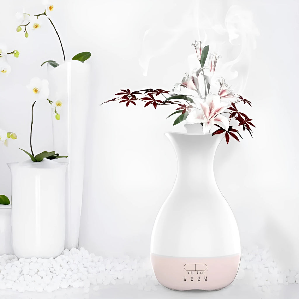 White ultrasonic humidifier with colourful night light functioning as aromatherapy diffuser and flower vase