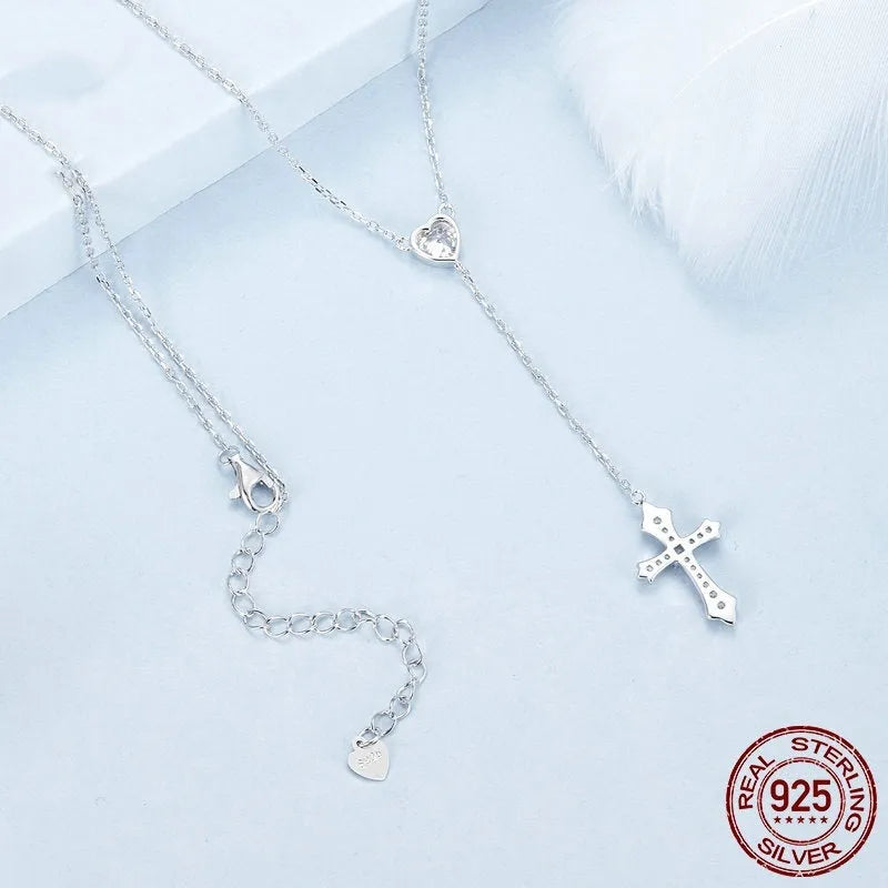 Silver cross necklace with O-ring chain in BSN384 colour, showing V-neck design
