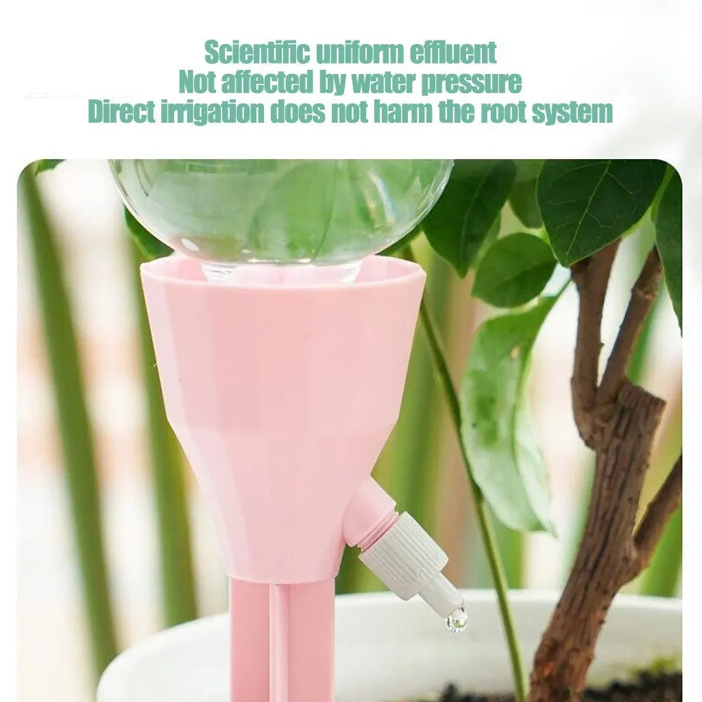 Automatic garden watering device in white, pink, and blue PP plastic, 16.5cm tall, for plant root watering