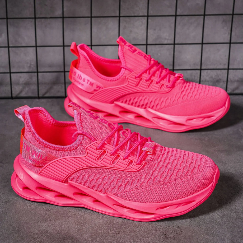 Women's FlyKnit mesh casual trainers in black, showing round toe and flat heel design.