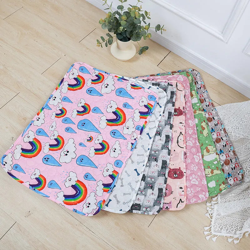 Reusable waterproof pet training pad with animal print design, shown in multiple sizes on a floor.