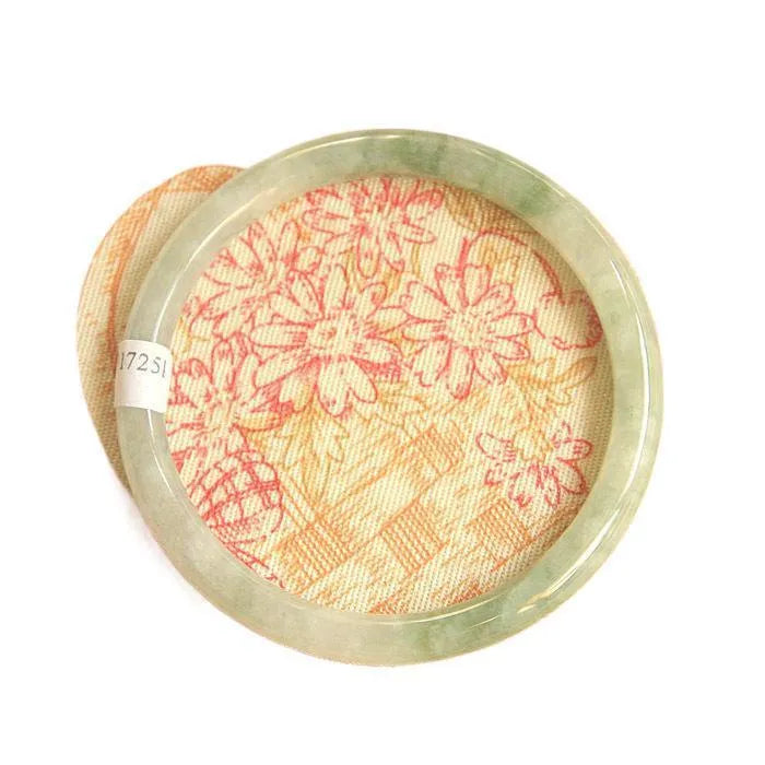 Traditional green jade waxy Chinese bracelet with geometric design showing 10mm profile