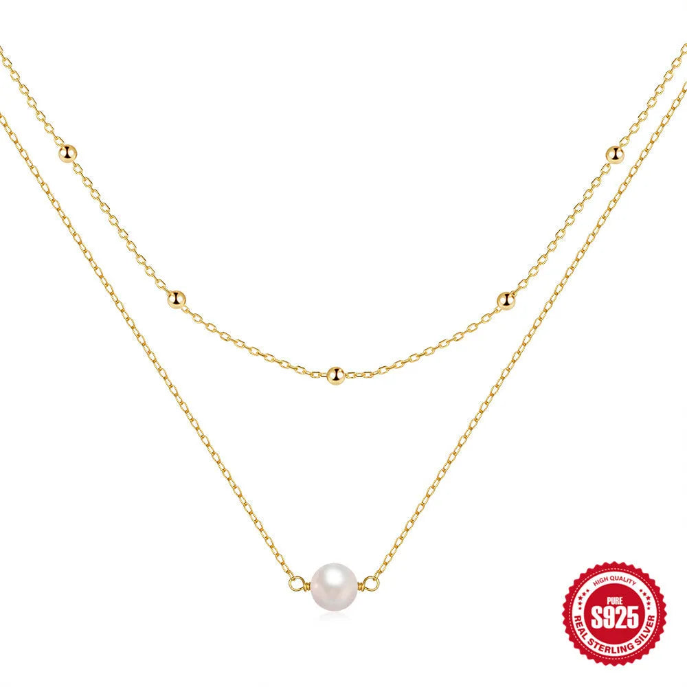 S925 sterling silver double layer necklace with twin pearl geometric pendant on a ball bead chain.