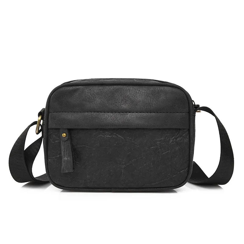 Men's waterproof paper crossbody bag in European and American retro style, shown in black colour