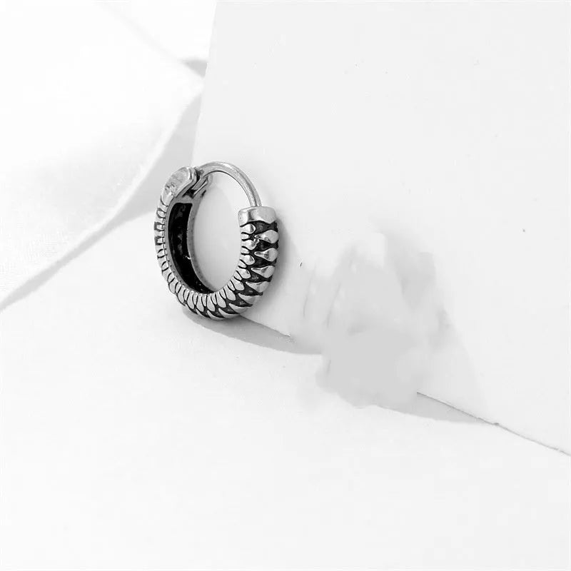 Silver geometric retro twist earrings with striped pattern made from stainless steel alloy