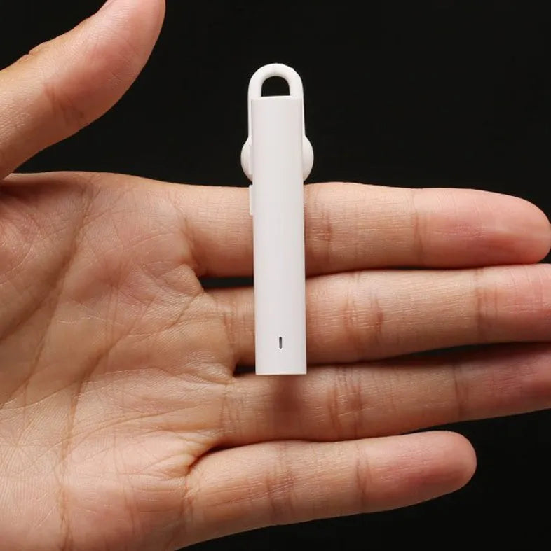 Compact wireless Bluetooth headset in black or white with 5.6 cm dimensions
