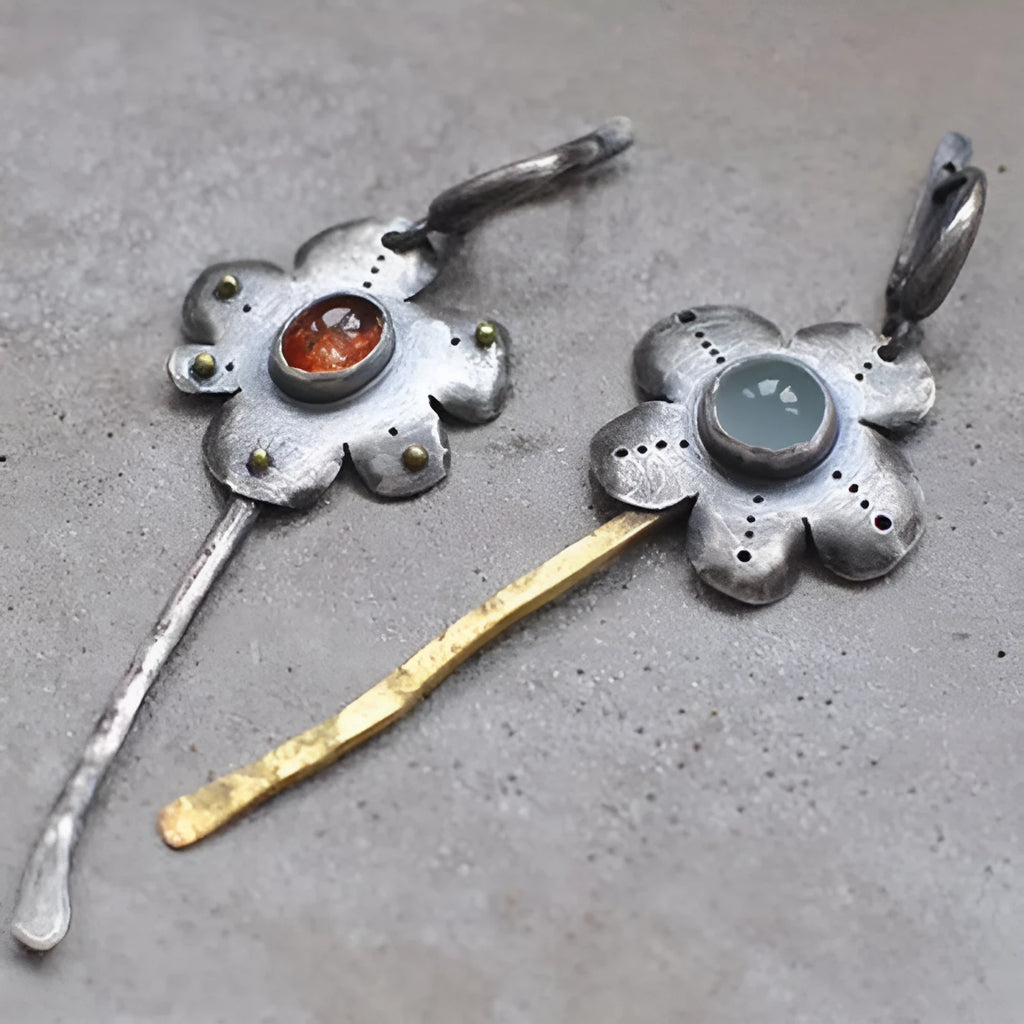 Long geometric flower earrings with two-tone asymmetrical colour on alloy metal.