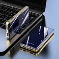 Mirror digital display power bank showing battery percentage, in black, blue, green, grey, or red.