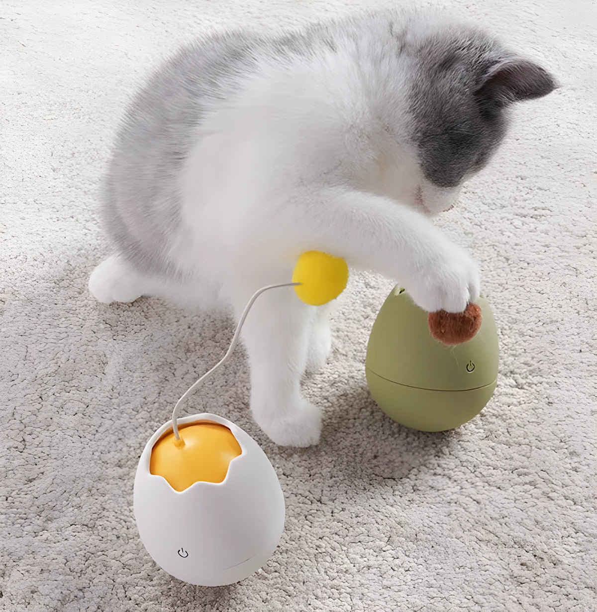 Funny cat artifact toy in green, made from ABS plastic, size 7x7x9cm, with cotton ball feature
