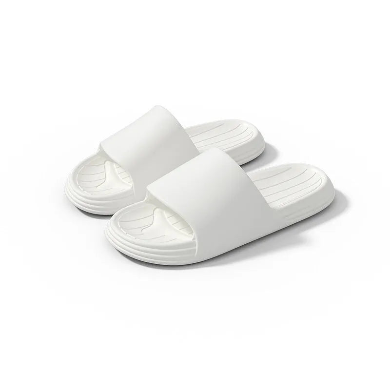 EVA indoor summer slippers with flower detail, shown in yellow, green, light grey, light pink, dark grey and white