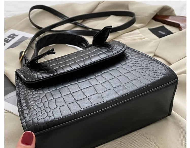 Women's small square retro armpit bag in black with stone pattern PU exterior and magnetic buckle