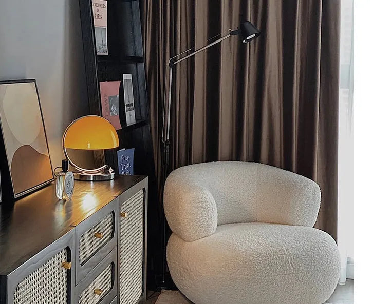 Retro space age table lamp with glass shade, LED light source, push button switch, available in orange or white.