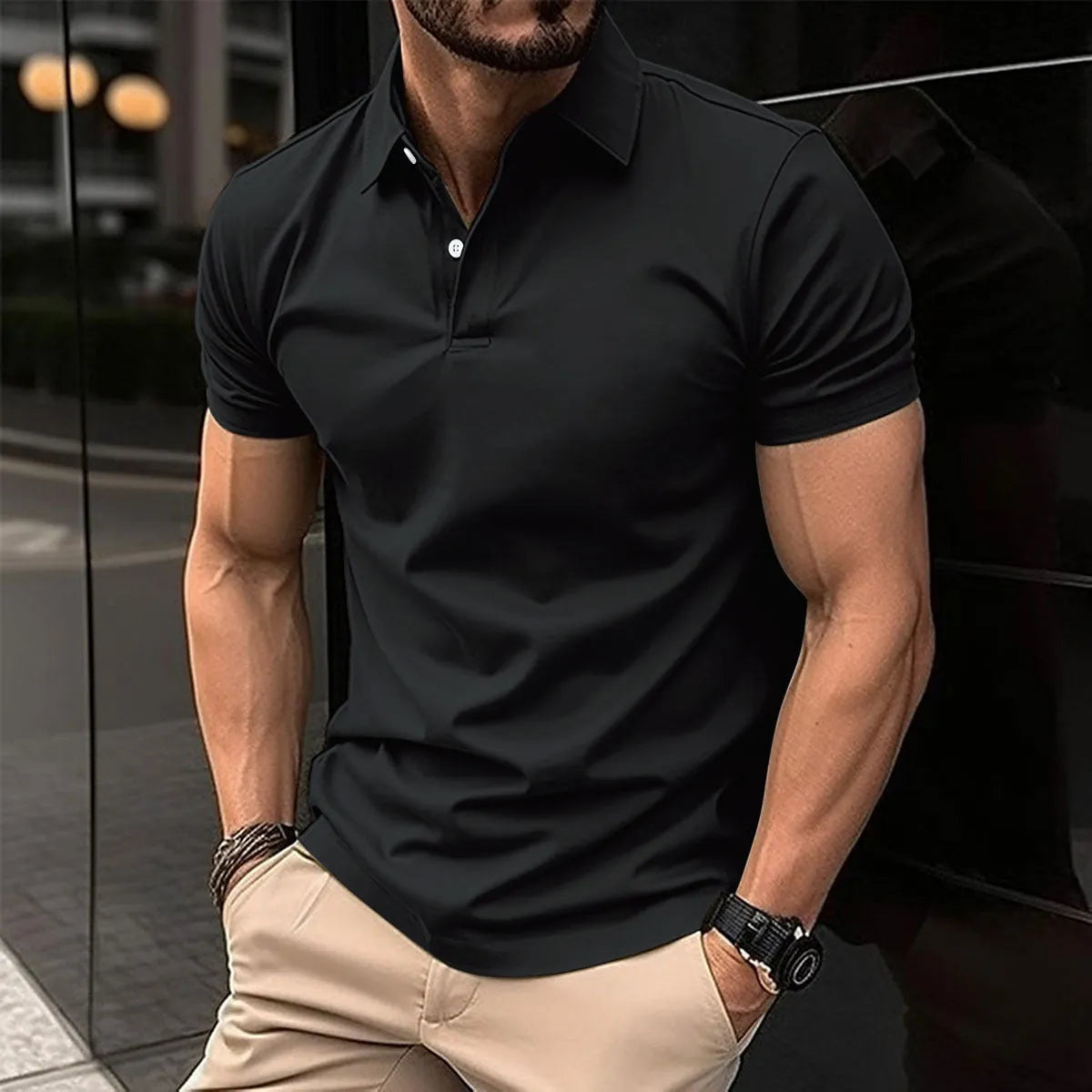 Men's solid colour short sleeve polo shirt with a button-down lapel collar on a hanger.