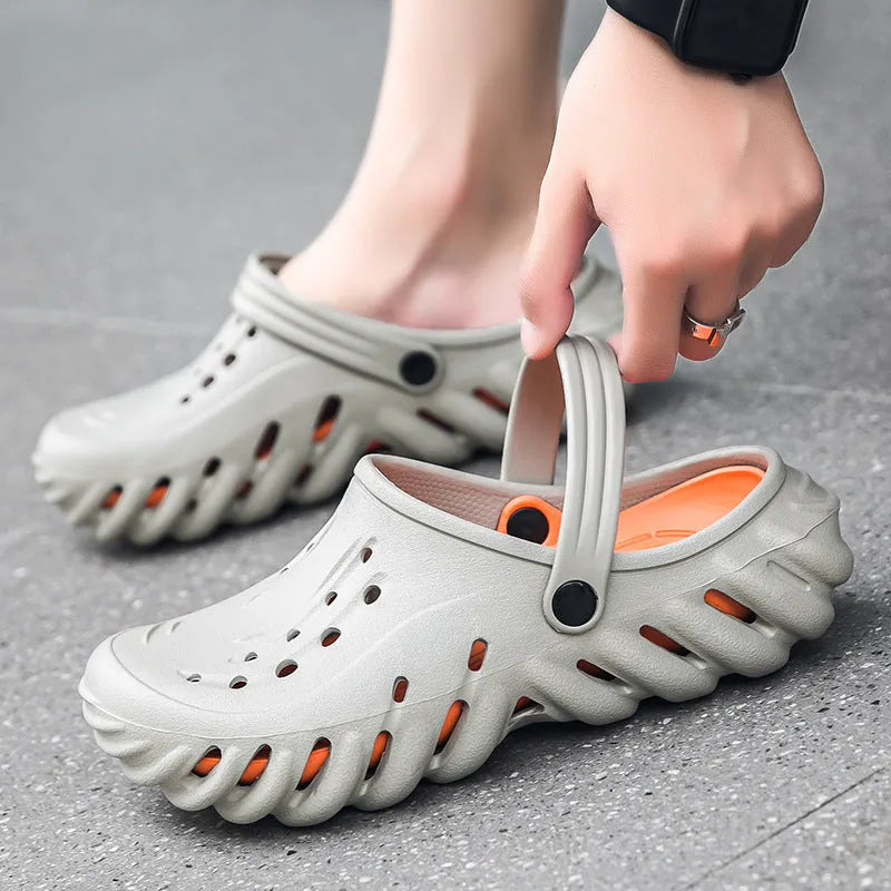 Men's beige EVA slipper sandals with hollow-out design and non-slip sole.