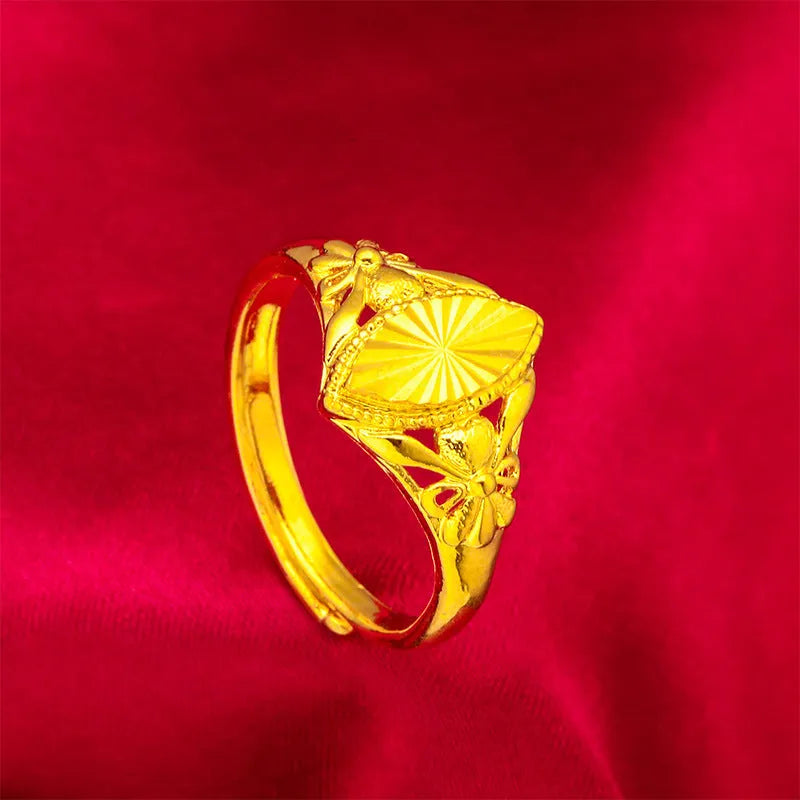 Gold electroplated brass ring with geometric open diamond flower design