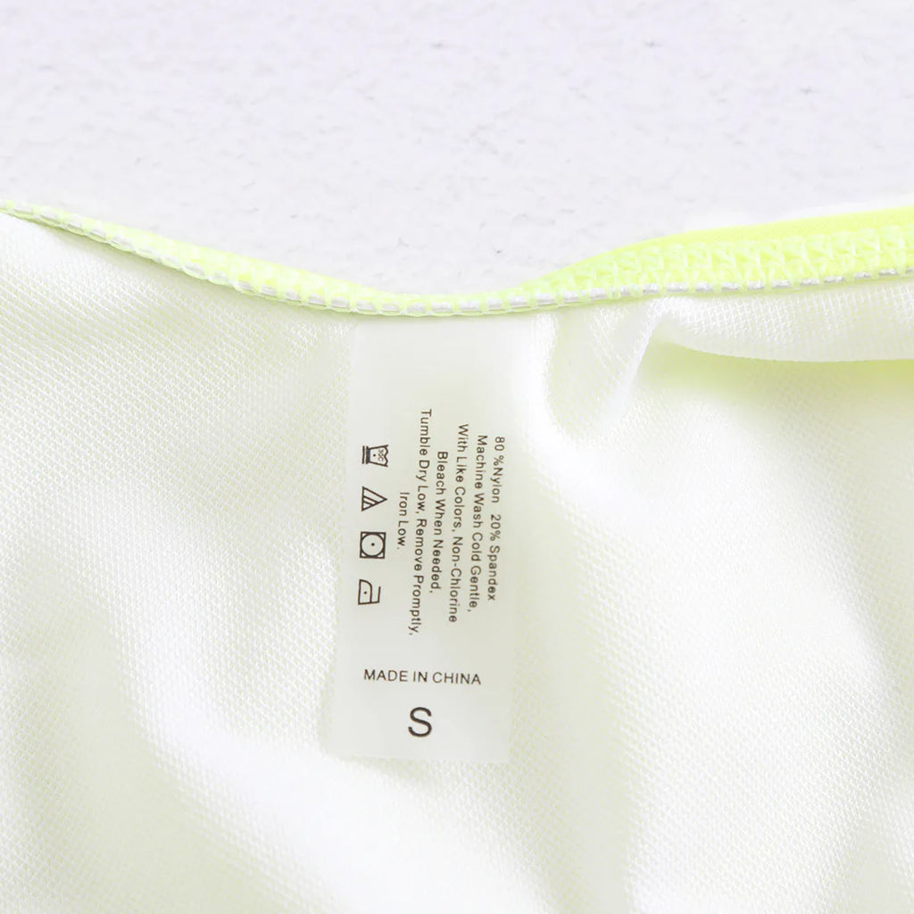 Three-dimensional 3D flower pattern on low waist bikini swimsuit in solid colour