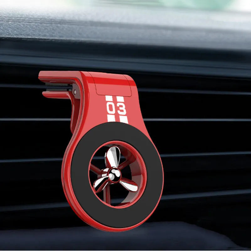 Magnetic car phone holder mounted on vehicle air vent with smartphone attached