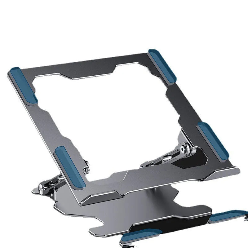Grey aluminium laptop stand in a folded position next to an open laptop, showing its adjustable angle and hollow design.