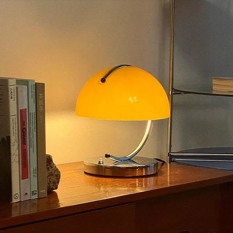 Retro space age table lamp with glass shade, LED light source, push button switch, available in orange or white.