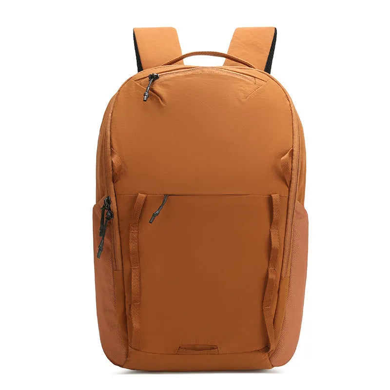 Waterproof Taslan backpack in solid colour with curved shoulder straps and splicing design elements